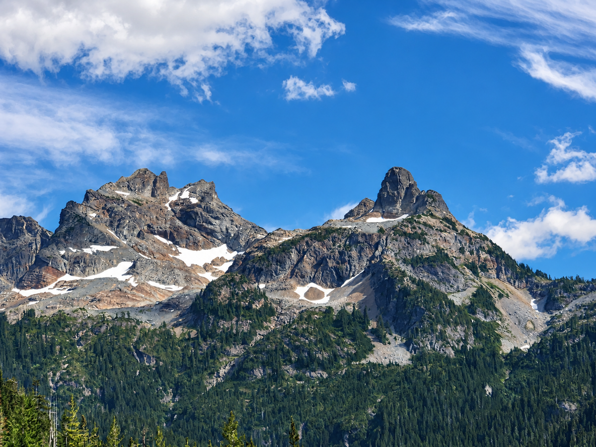 Alpine Peaks Beneath Blue Skies
